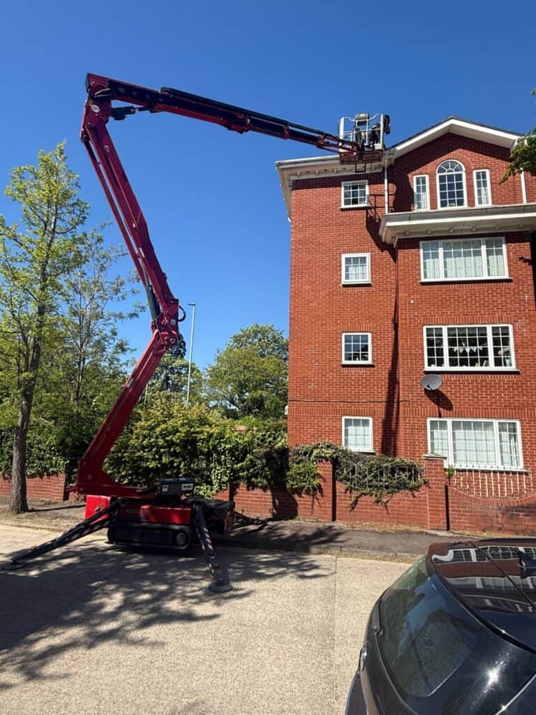 cleaning the exterior of a block of flats
