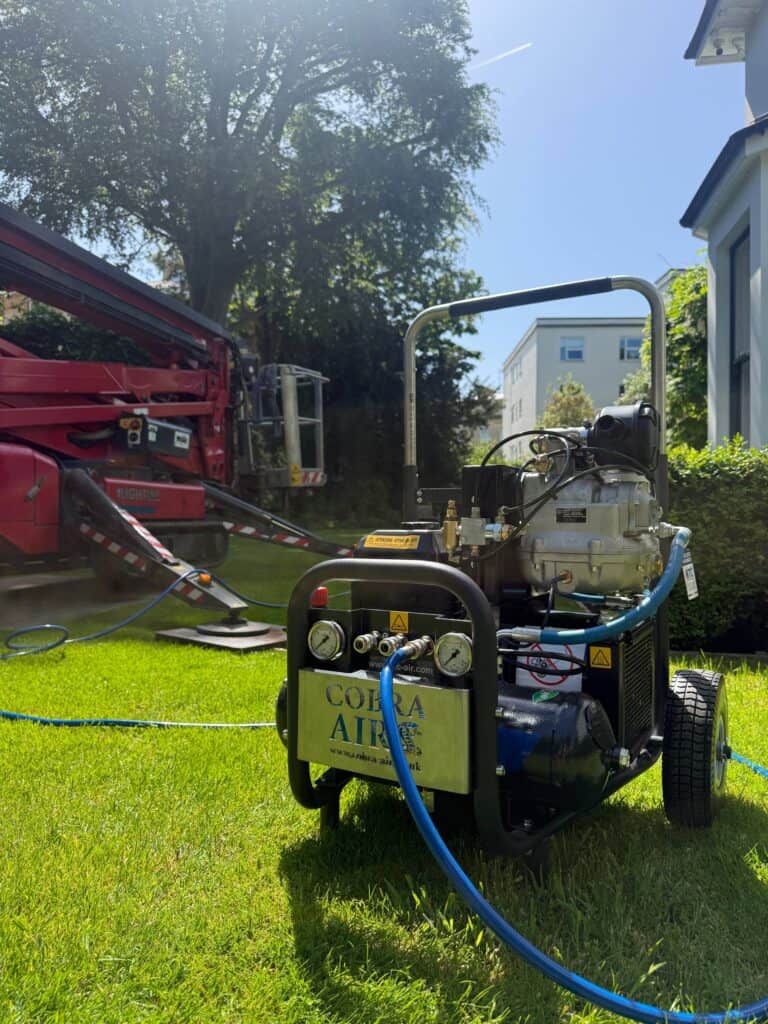 roof cleaning methods - compressed air scraping